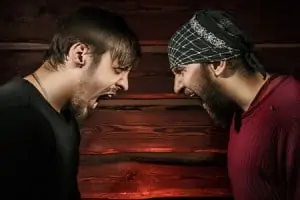32084057 - two brutal man looking into each other's eyes